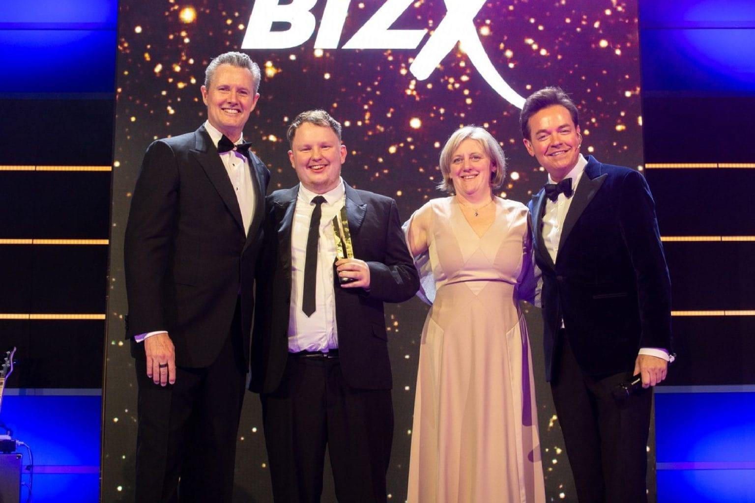 Lee Hart, Director and Founder of Unbranded Digital winning Year Entrepreneur Award in 2024 at BizX